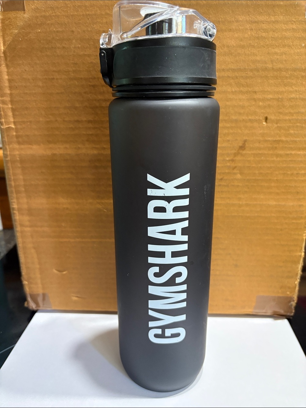 Gymshark Black 36 oz water Bottle with White Vertical Logo and wrist strap